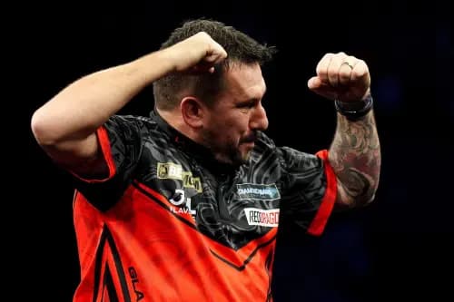 Wales' Jonny Clayton celebrates after winning. Pic. Alamy