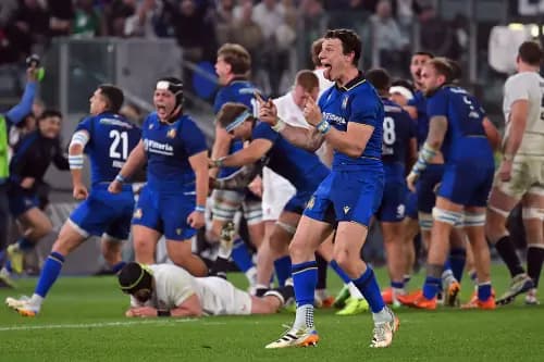 Italy's players celebrate their victory over England. Pic. Alamy