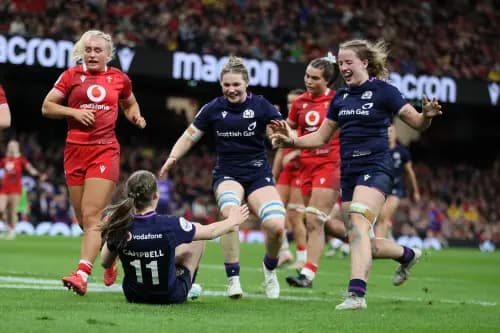 Shona Campbell of Scotland celebrates with her teammates after she scores against Wales. Pic: Alamy.